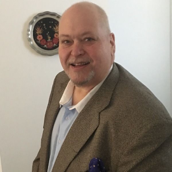 John G. Manjounes
